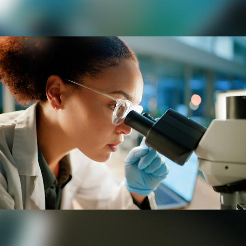 Doctor performing surgery with a team